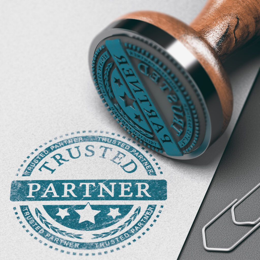 papier avec un texte "trusted partner"